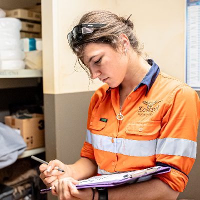 Female Kestrel Cleaning staff member filling out a safety checklist